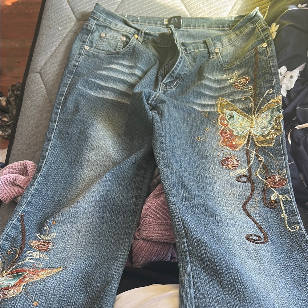 Blue Flare Jeans with Embroidered Butterfly and Distressed Details